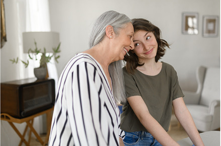 Senior grandmother with teenage, a Person Photo by HalfPoint