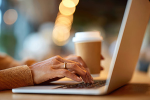 Cozy workspace with laptop and coffee, a Food & Drink Photo by AlyaAnd