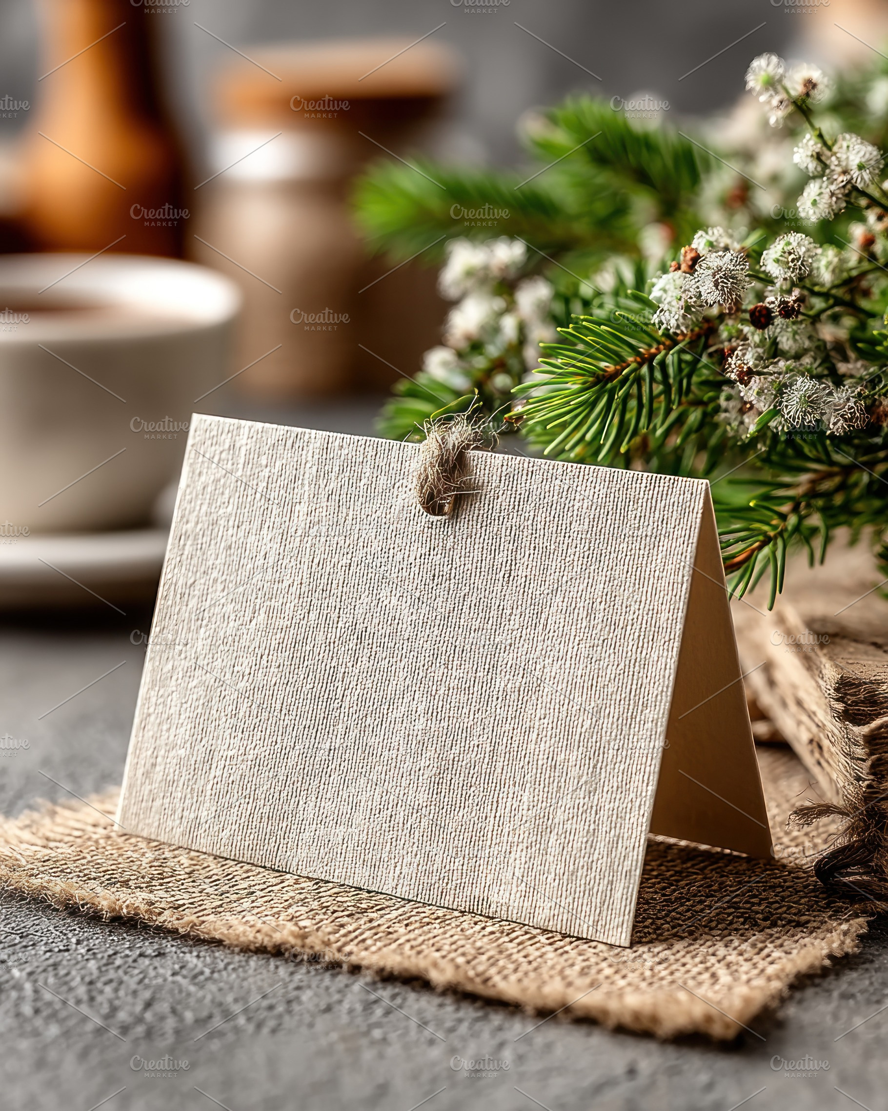 Rustic blank greeting card with textured paper and string on bur, a Holiday Photo by José Manuel Gelpi
