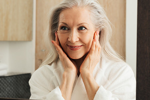 Portrait of a smiling mature woman, a Person Photo by Artem Varnitsin