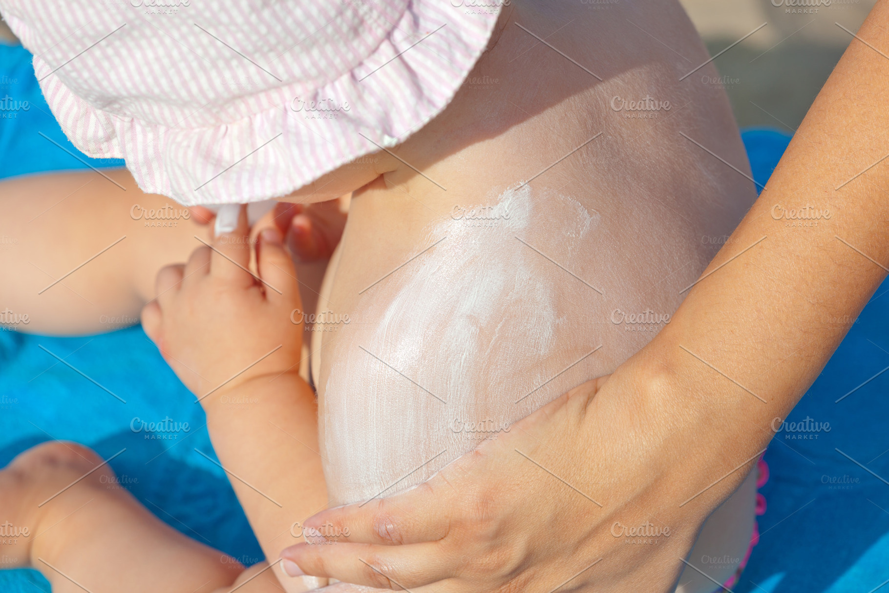 Baby sunscreen cream., a Person Photo by Antonio Gravante Market