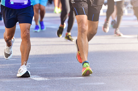 People Running On City Road.