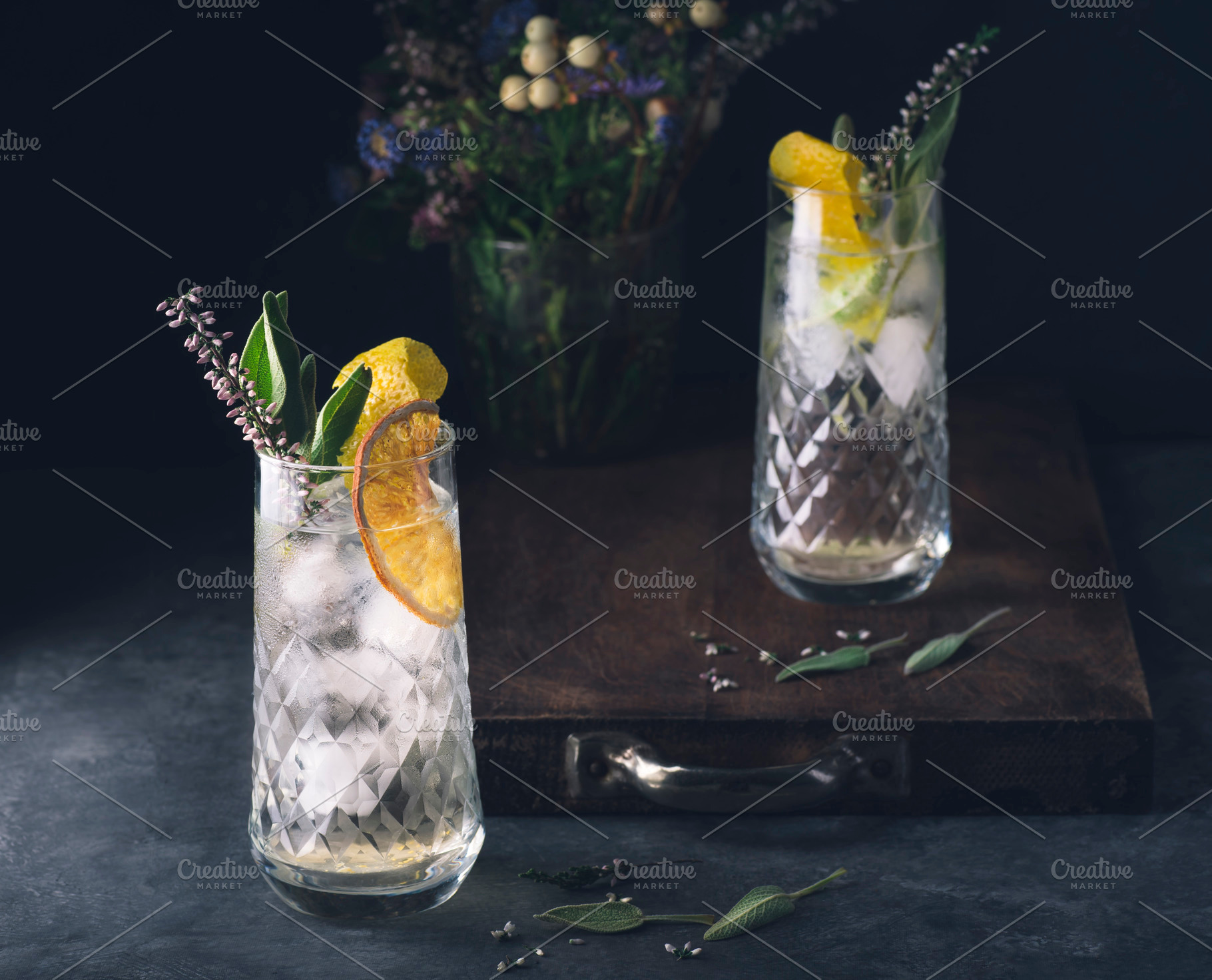 Gin-based cocktail with dry orange, a Food & Drink Photo by UliaA