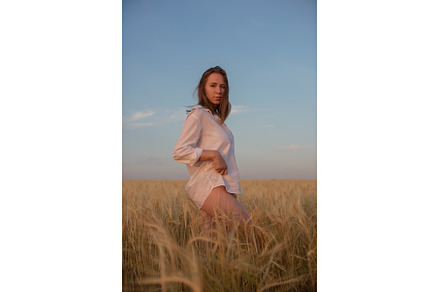 Woman in White Shirt at Sunset in, a Person Photo by Jan Jack Russo Media