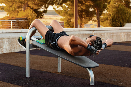 Man doing sit-ups on outdoor exercis, a Sports & Recreation Photo by Perpis