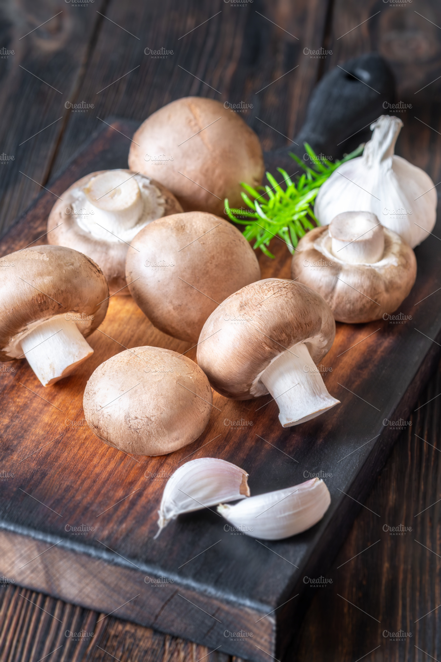 Raw brown champignon mushrooms with, a Food & Drink Photo by Alexander Prokopenko