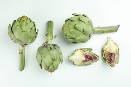 Concept of healthy food with artichoke on white background, a Food & Drink Photo by AtlasStudio