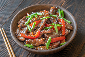 Chinese Beef Stir Fry Garnished With Scallions Sesame Seeds And, a Food & Drink Photo by Alexander Prokopenko