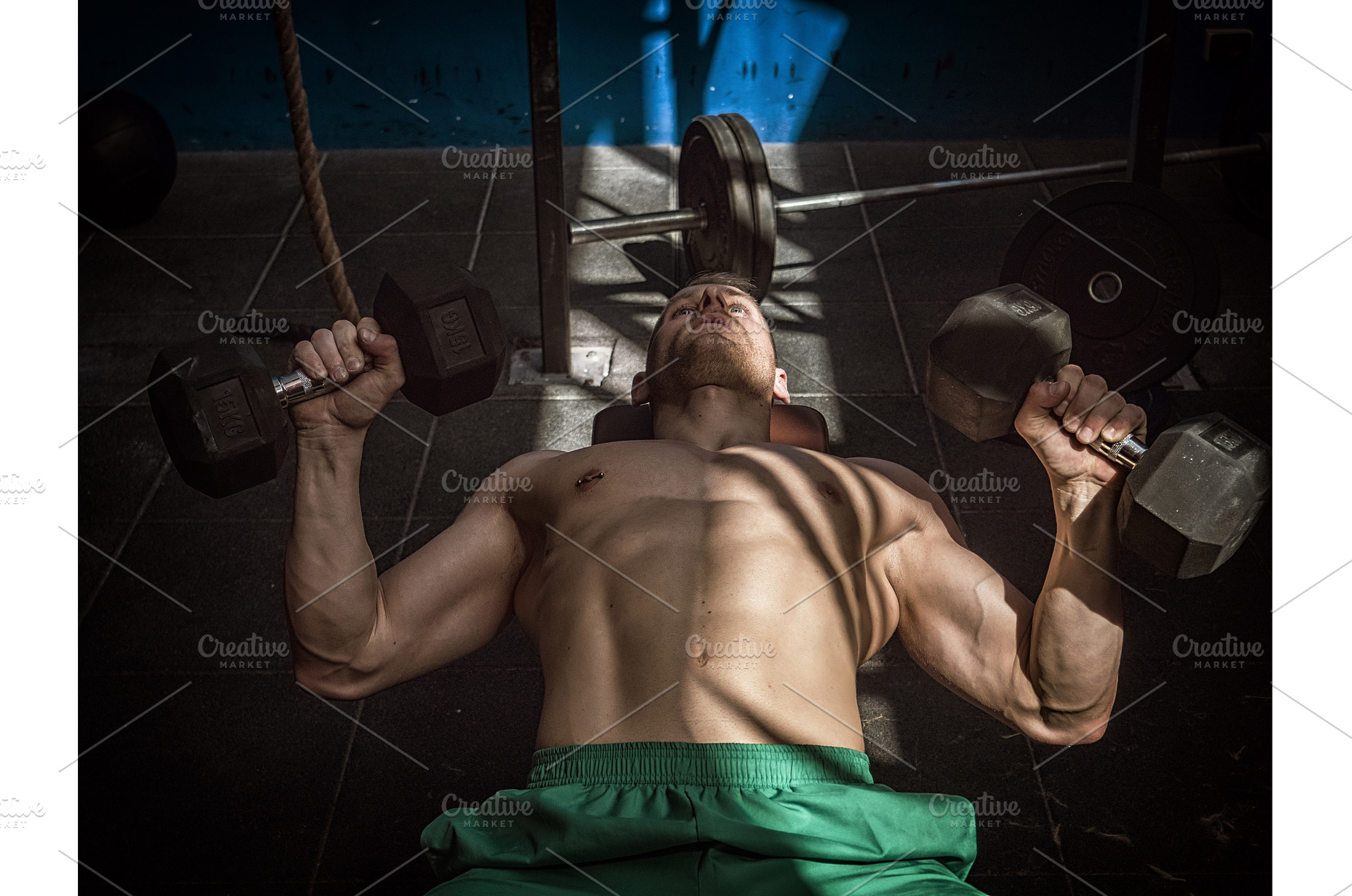 Handsome young man doing abs, a Person Photo by ArtOfPhotos photo store