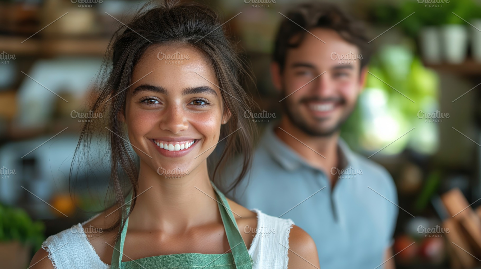 A young woman of mixed ethnicity smiles brightly while wearing an apron, with a, a Person Photo by ImageMir