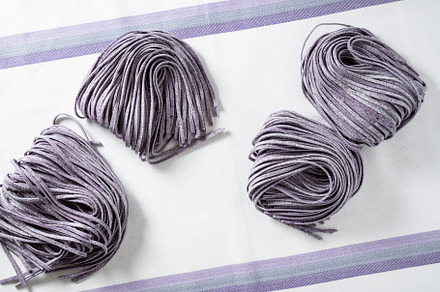fresh raw homemade purple blueberry pasta on tablecloth, a Food & Drink Photo by IriGri