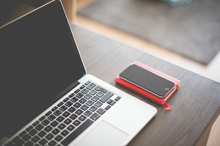 Macbook Pro In A Desk Stock Photograph preview 5