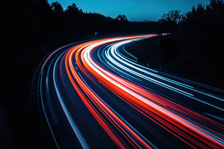 Captivating light trails on a windin, a Photo by Tanuart
