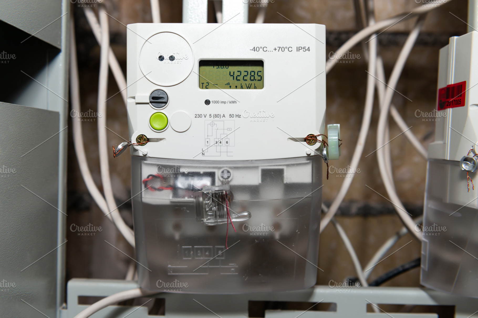 Electrical meter with electrical power cables, an Industrial Photo by Vapi