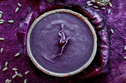 bowl with some red cabbage soup, a Photo by Nito