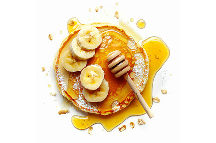 Pancakes with banana slices, honey, a Food & Drink Photo by Ylivdesign