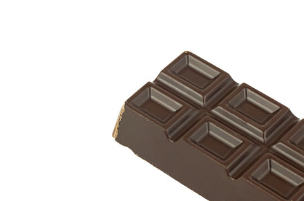 Chocolate bar isolated on white back, a Food & Drink Photo by AlexBush