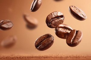 Roasted coffee beans in the air, a Food & Drink Photo by MistyDay