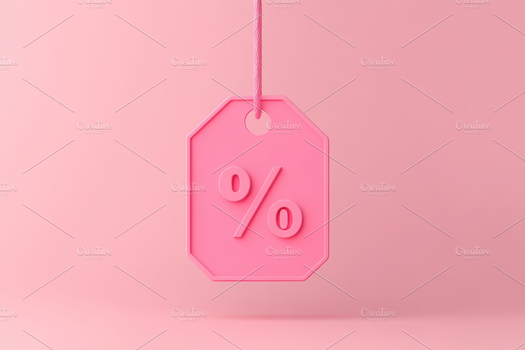 Pink shopping tag signals big deals, a Photo by Pavel_design