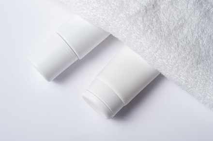 White plastic tube for cosmetic with terry towel, minimalistic c