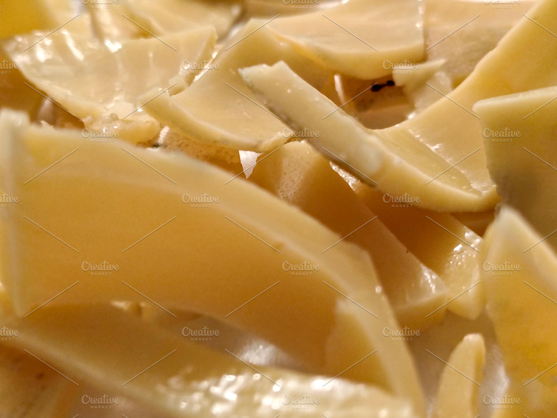 Close-up of uncooked yellow pasta curls, a Nature Photo by DanFLCreativo