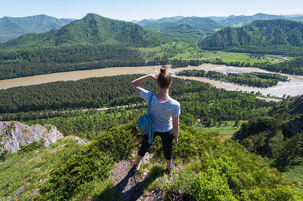 Woman in altai mountain stock photo containing mountain and peak, a Person Photo by Jan Jack Russo Media