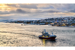 Boat in the sea at Tromso, Norway, a Transportation Photo by Leonid Andronov