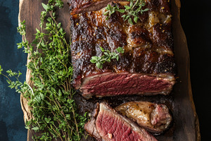 Juicy roast beef with fresh herbs, a Photo by Beautiful things