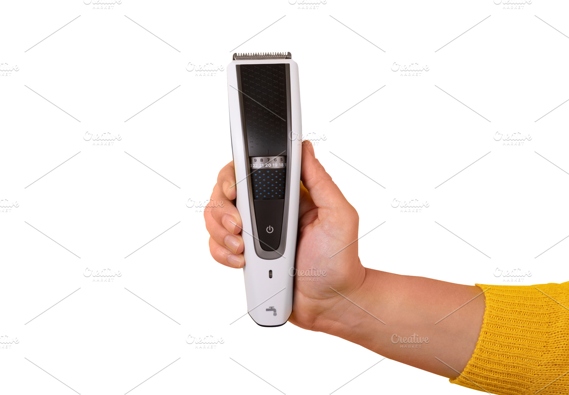 Close-up of a hand in yellow sleeve holding a modern electric be, a Person Photo by Ales Munt
