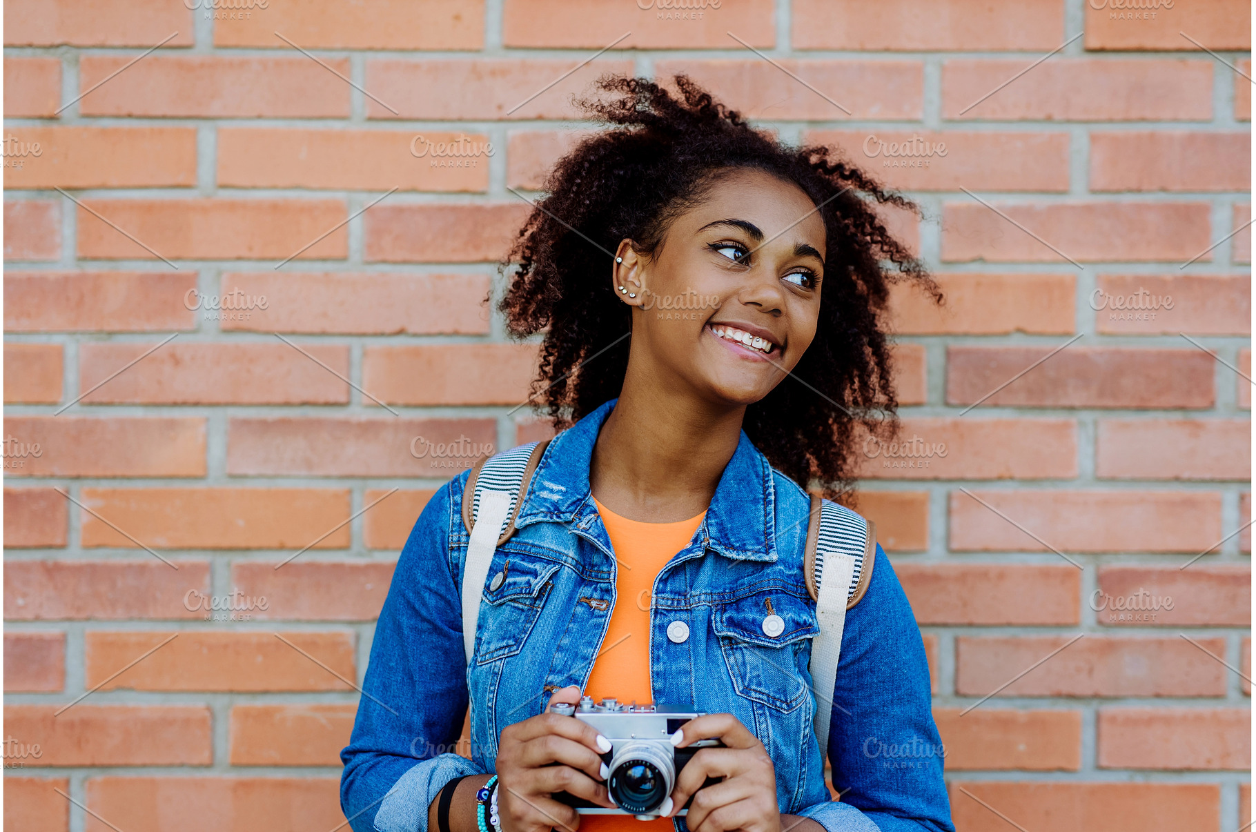 Multiracial girl standing in front, a Person Photo by HalfPoint