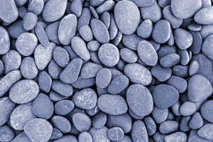 Natural pebble stone background, an Abstract Photo by BOOCYS