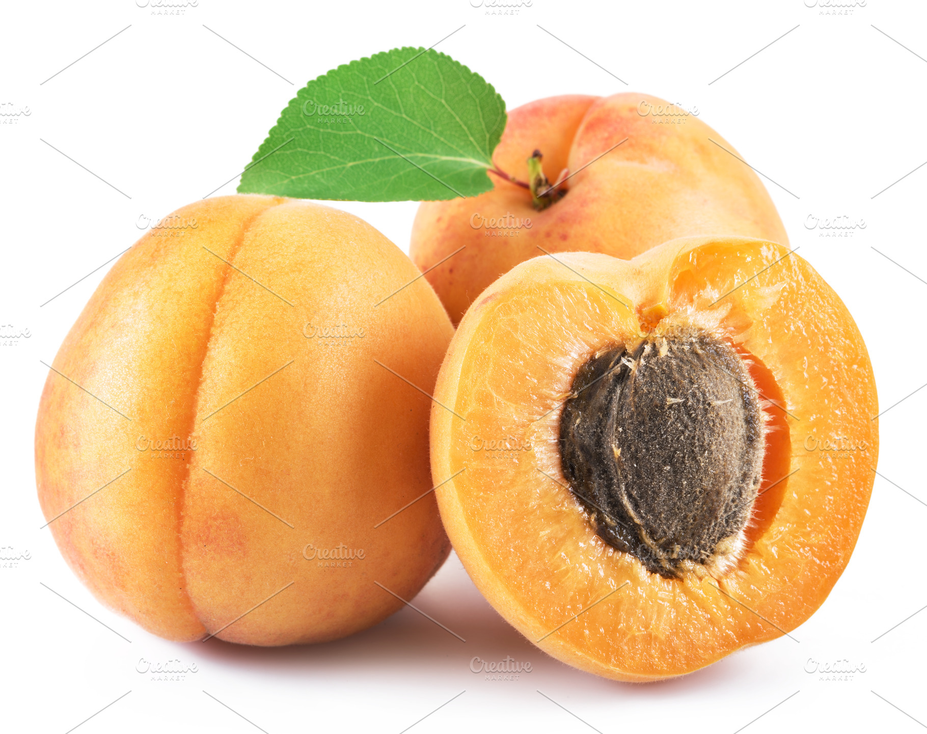 Ripe apricots isolated on the white, a Photo by Volff
