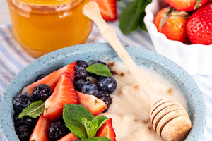 Wheat semolina porridge with fresh summer berry, a Food & Drink Photo by Rimma