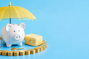 Piggy bank surrounded by coins and m, a Photo by Dvoevnore photos