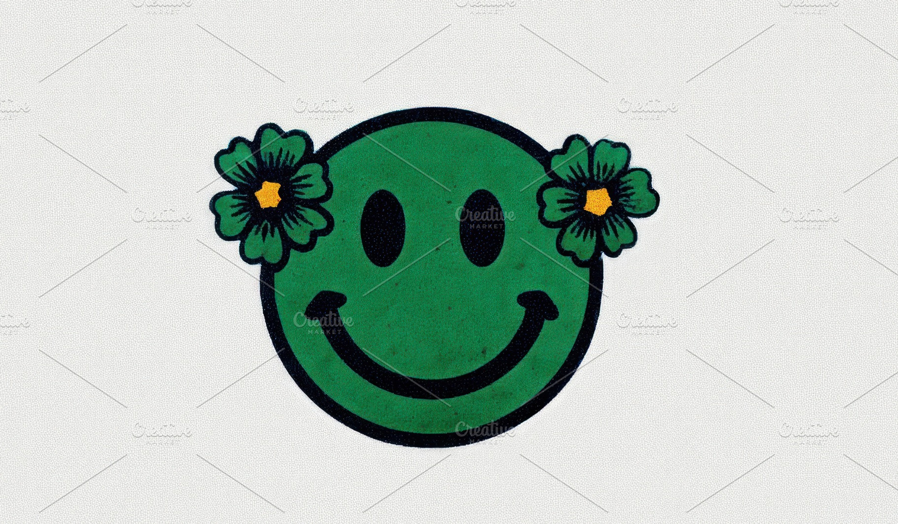Green smiley face with cartoon flowers on ears against white bac, an Abstract Photo by José Manuel Gelpi