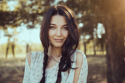 Happy woman in forest enjoying stock photo containing happy and joy, a Holiday Photo by Emotion photo