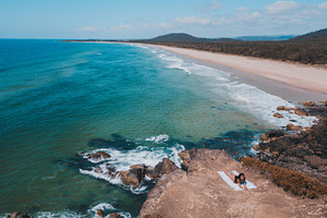 Tanning on cliff near beach