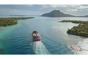 Aerial drone of red cargo ship, a Nature Photo by Goinyk