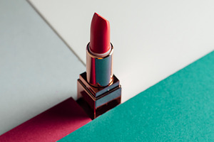 Lipstick on modern colorful geometri featuring lipstick, make up, and nobody