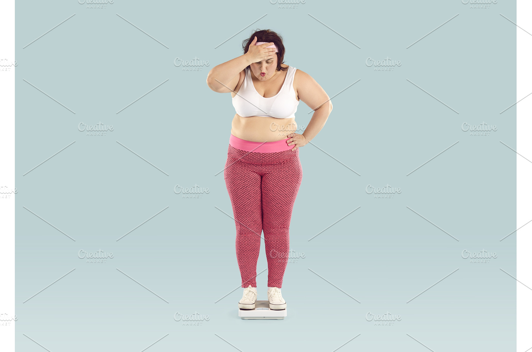 Funny overweight woman weighs, a Sports & Recreation Photo by StudioRomantic