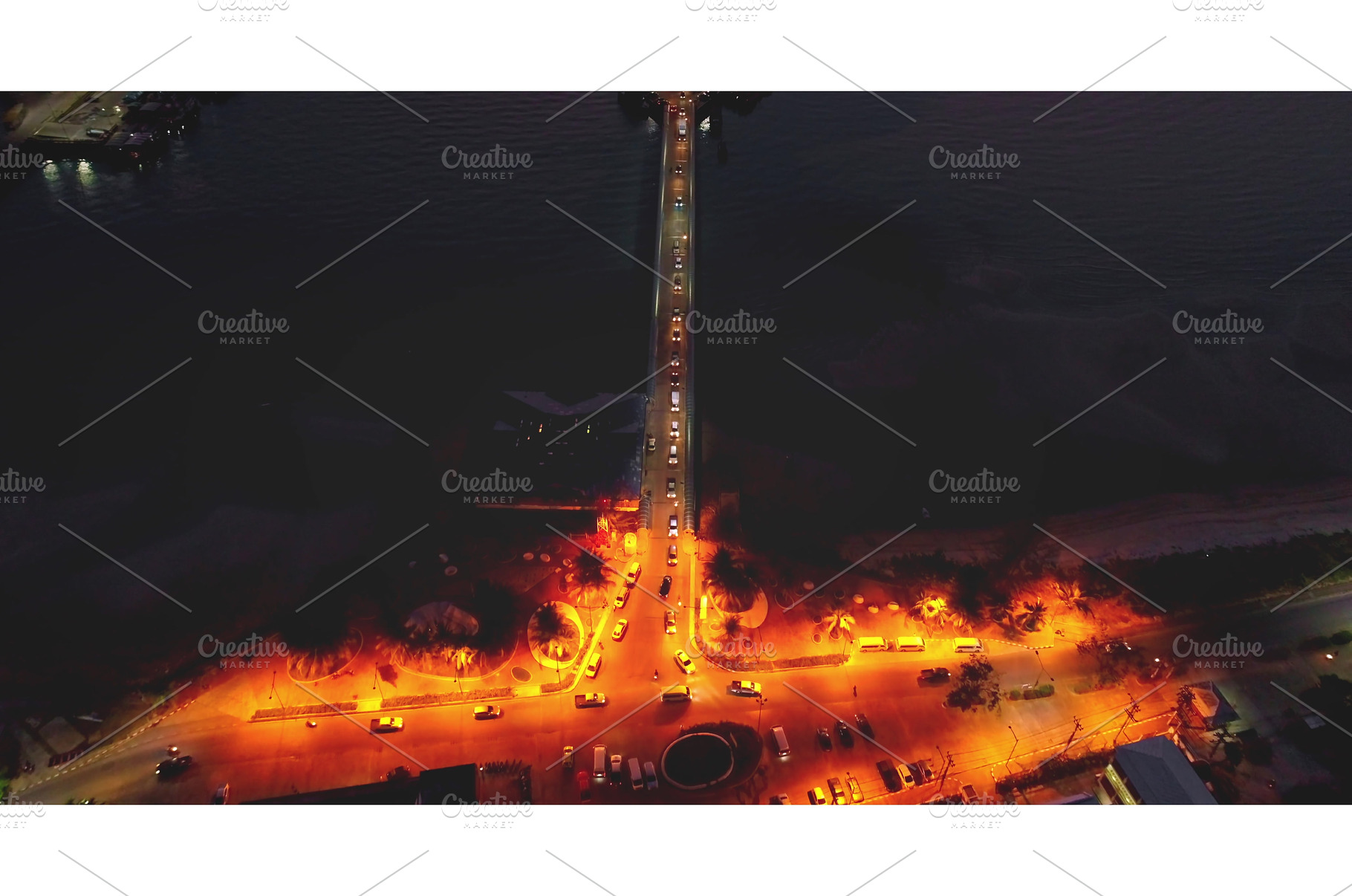 Cars driving at night on bridge over, a Transportation Photo by Goinyk