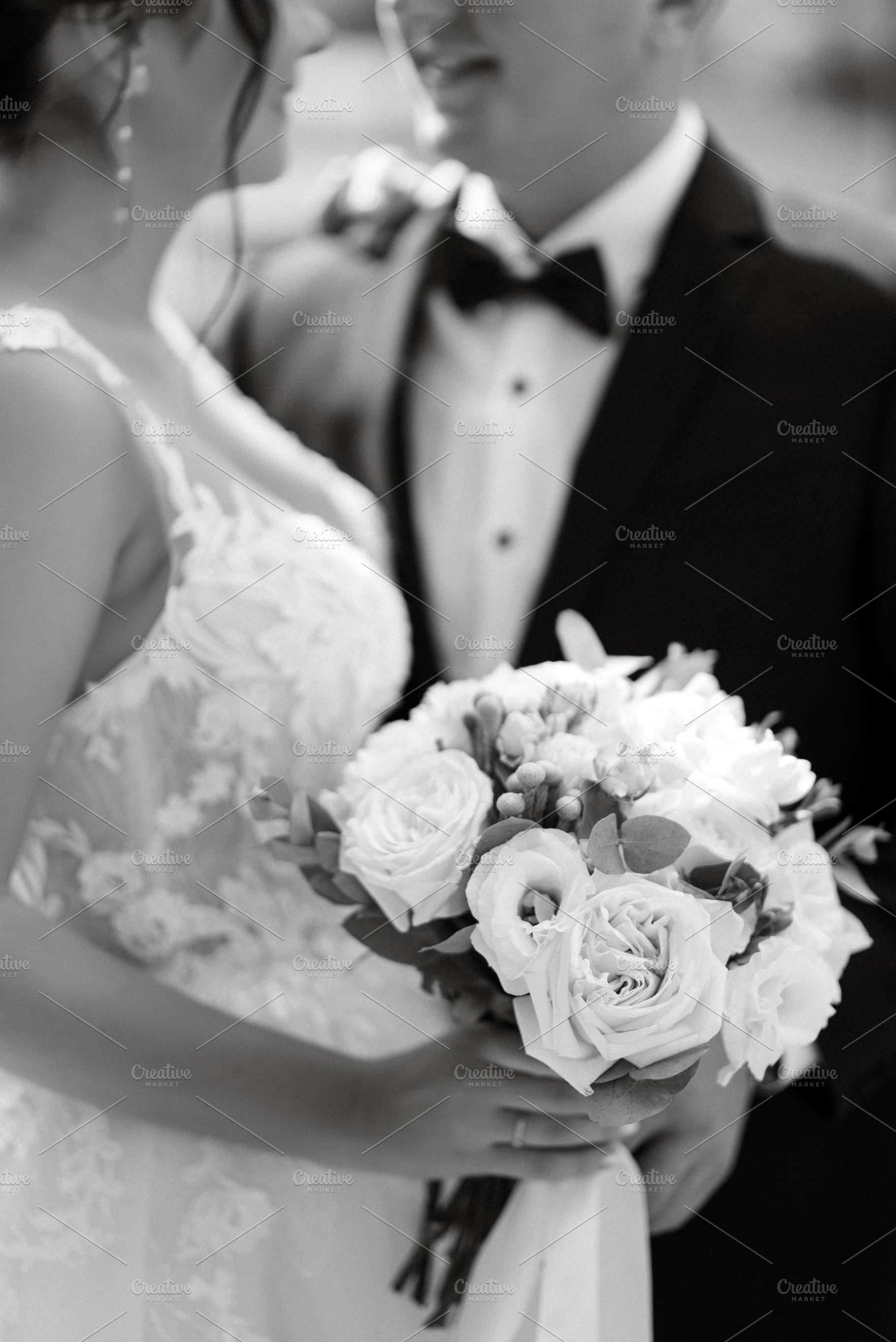 the groom in a brown suit and the bride in a white dress, a Person Photo by Weddings, People, Travel