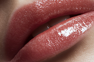 Woman's glossy pink lips showing sparkling makeup, highlighting, a Beauty & Fashion Photo by Studio ANNA
