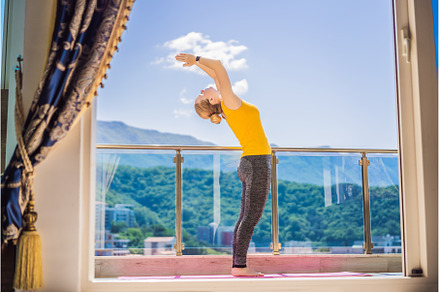 Beautiful woman doing yoga outdoors, a Sports & Recreation Photo by Elizaveta Galitskaya