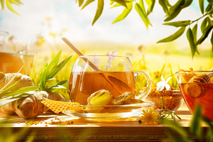 Natural herbal beverage with honey and ginger in meadow, a Food & Drink Photo by Davizro's Market
