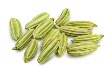 Dried fennel seeds isolated on white, a Food & Drink Photo by NataPhoto