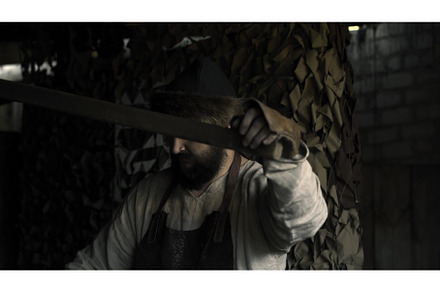 A working blacksmith on the street, a Person Photo by Media Whale Stock