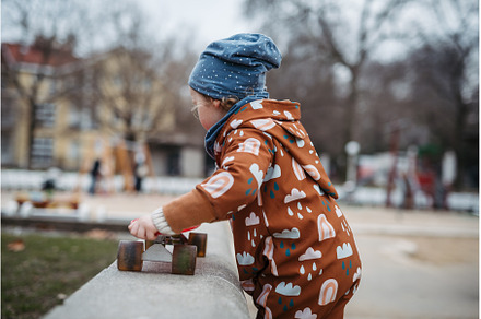 Cute toddler girl playing outdoor in, a Nature Photo by HalfPoint