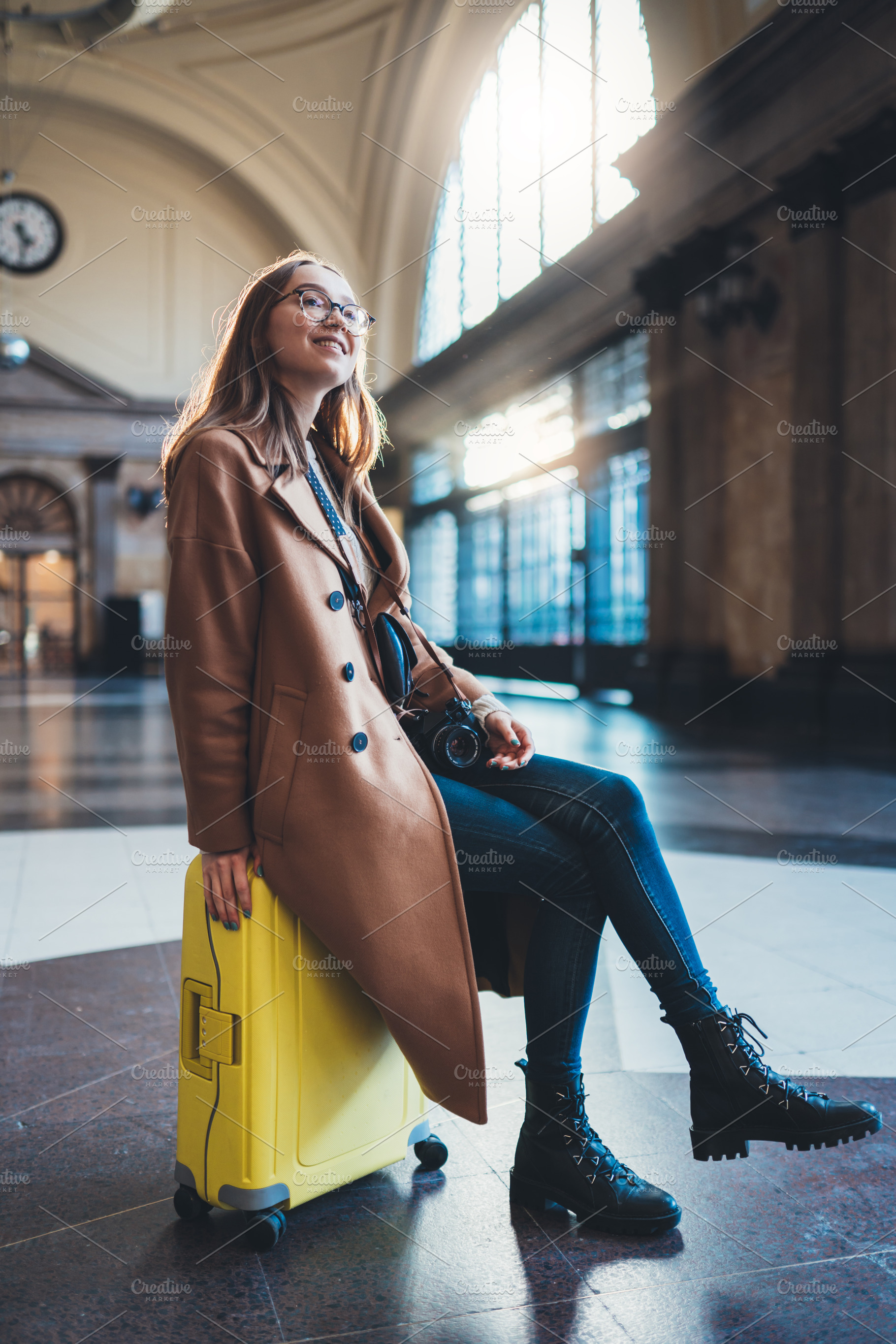 Girl at the station featuring woman, waiting, and suitcase, a Person Photo by A_B_C