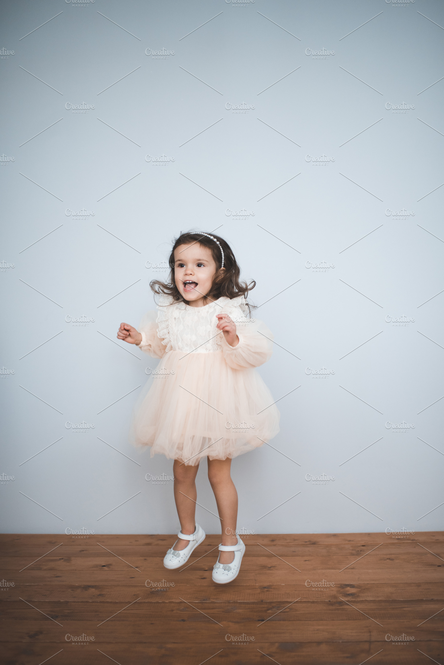 Cute kid girl wearing princess dress, a Person Photo by morrowlight